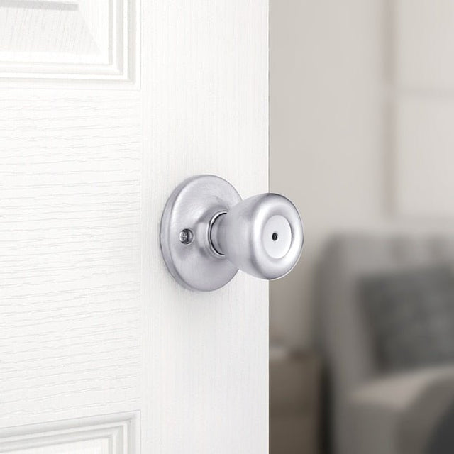 Kwikset Security Tylo - Perilla de privacidad para cama/baño, cromada satinada